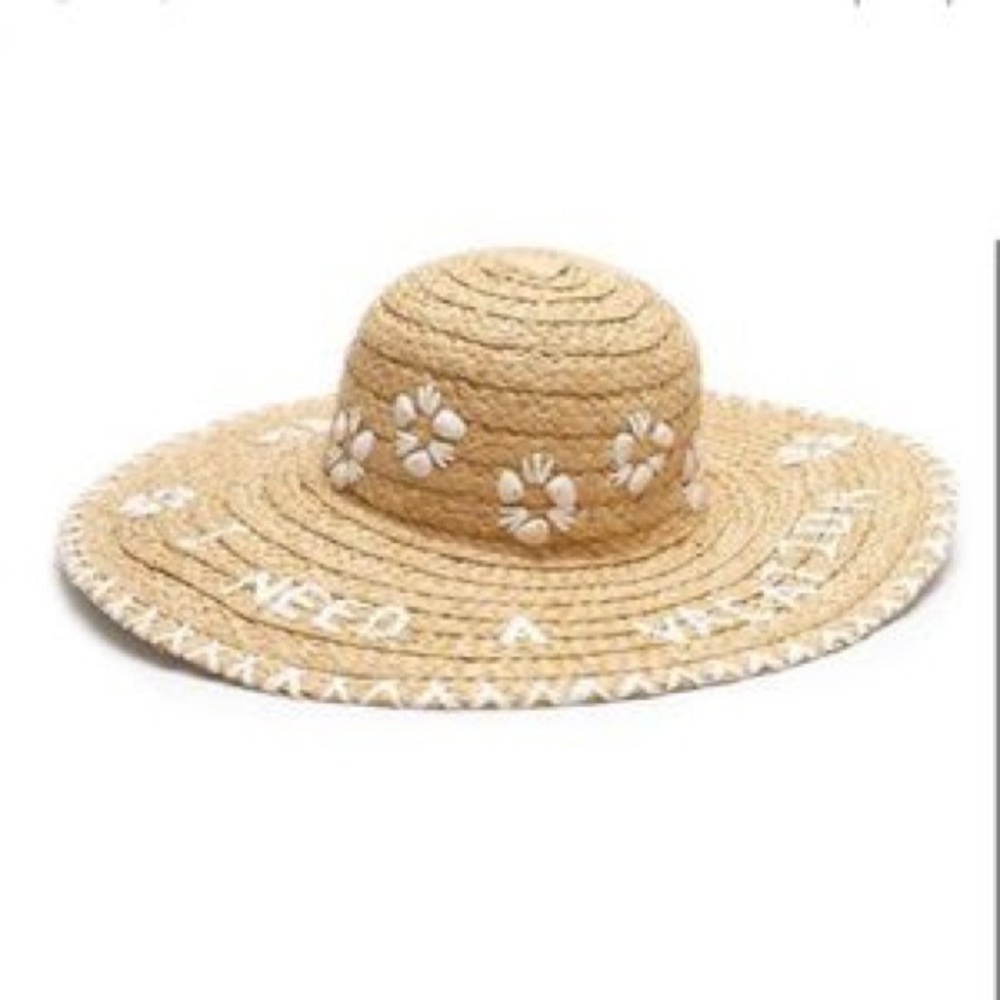 The classic Kate Spade floppy straw “I Need a Vacation” hat. New with tags.